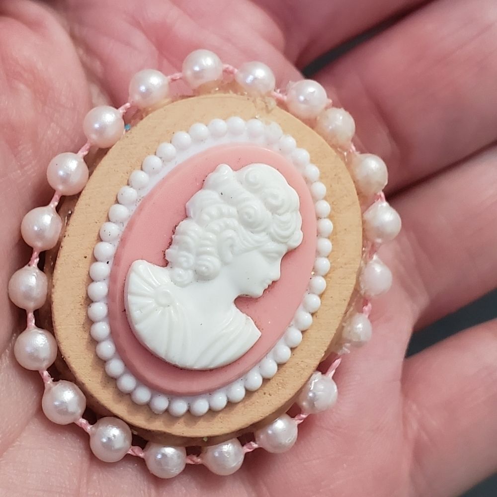 Pink wooden cameo brooch